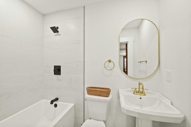 full bathroom featuring shower / washtub combination, toilet, and a sink