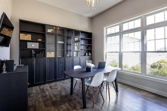 office with dark wood finished floors, baseboards, and visible vents