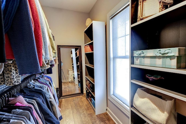 spacious closet with light wood-style flooring