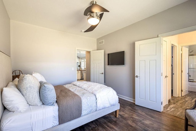 bedroom with visible vents, baseboards, ceiling fan, and dark wood-style flooring