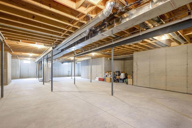 unfinished basement with water heater