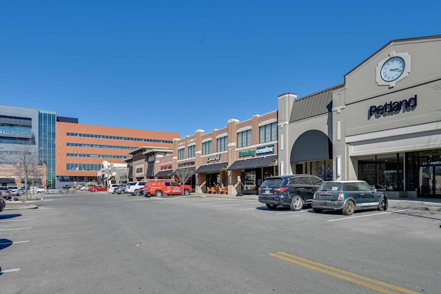 view of property with uncovered parking