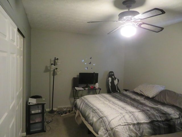 bedroom with ceiling fan and carpet flooring