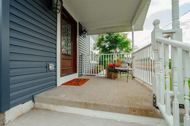 entrance to property with covered porch