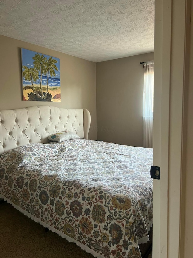 bedroom with a textured ceiling