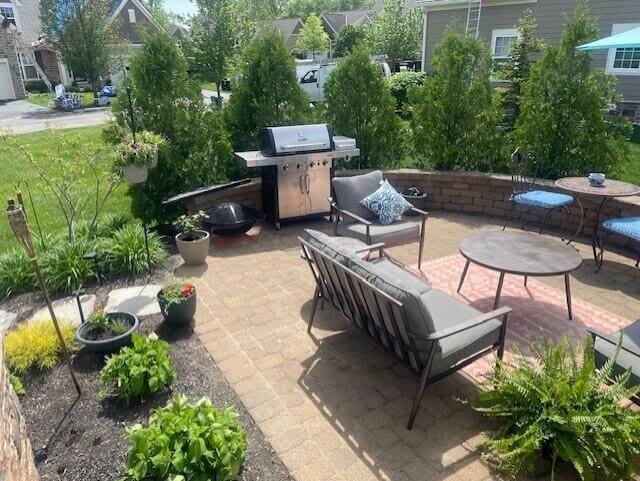 view of patio featuring a grill