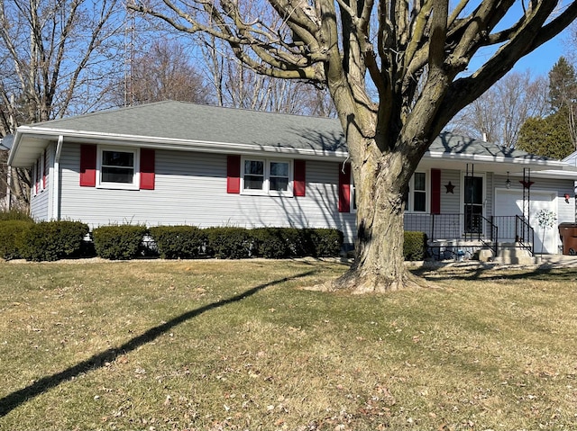 ranch-style home with a porch, a front lawn, a garage, and a shingled roof