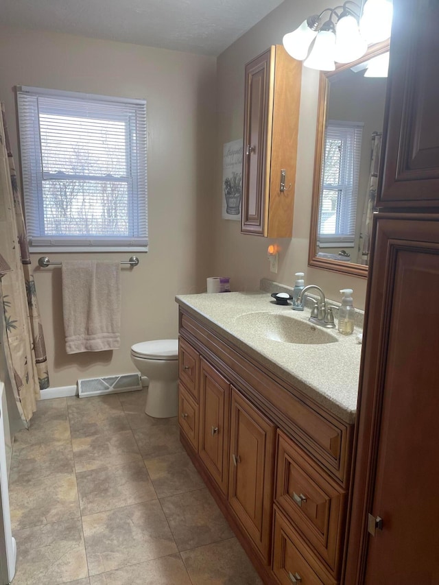 full bath with a shower with shower curtain, visible vents, toilet, and vanity