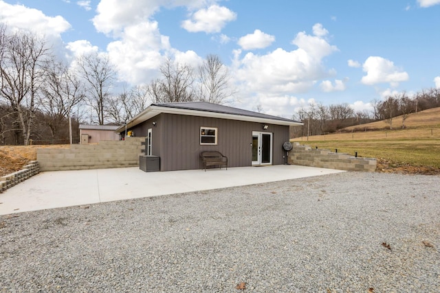 exterior space with french doors, a patio, and fence