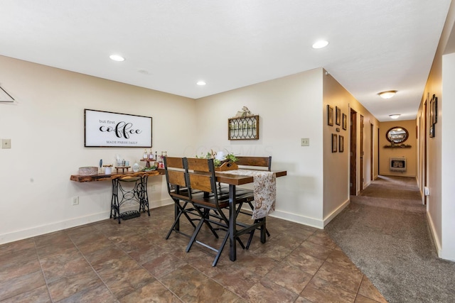 dining area with recessed lighting and baseboards