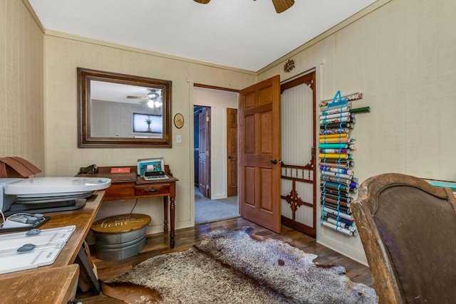 office area with a ceiling fan and wood finished floors