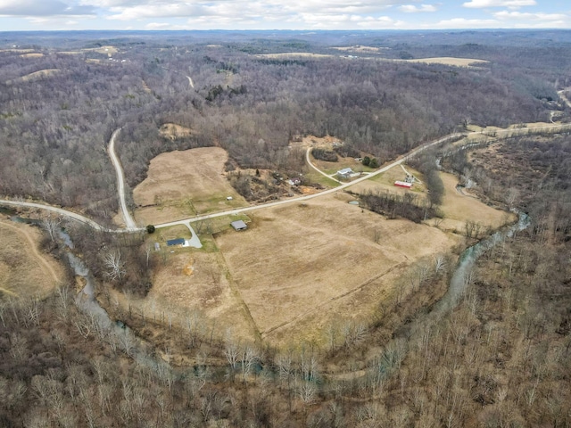 aerial view featuring a view of trees