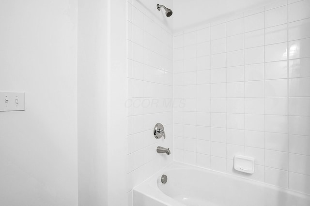 bathroom with shower / bath combination