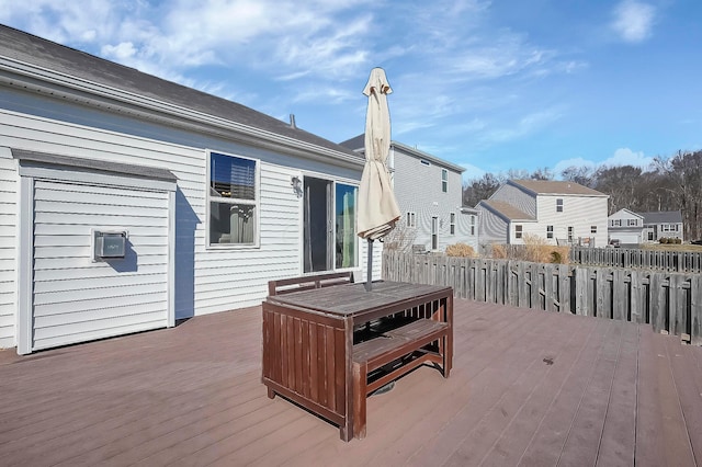 wooden deck featuring a residential view