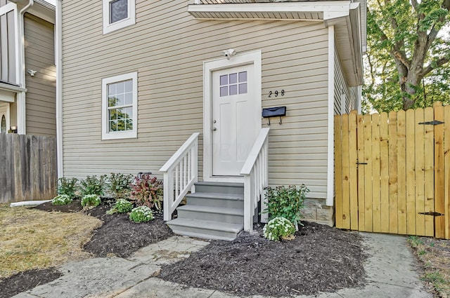 property entrance featuring fence