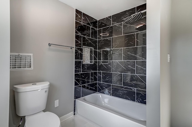 full bathroom with bathtub / shower combination, toilet, and baseboards