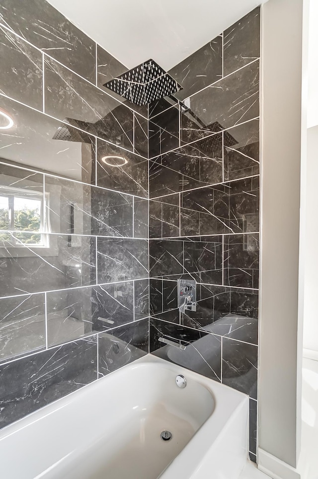 bathroom featuring shower / bath combination