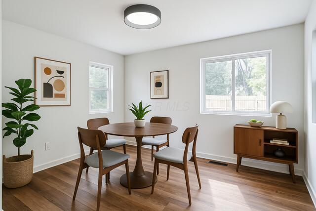 298 Clarendon Ave, Columbus, OH 43223 - dining area with wood finished floors and baseboards