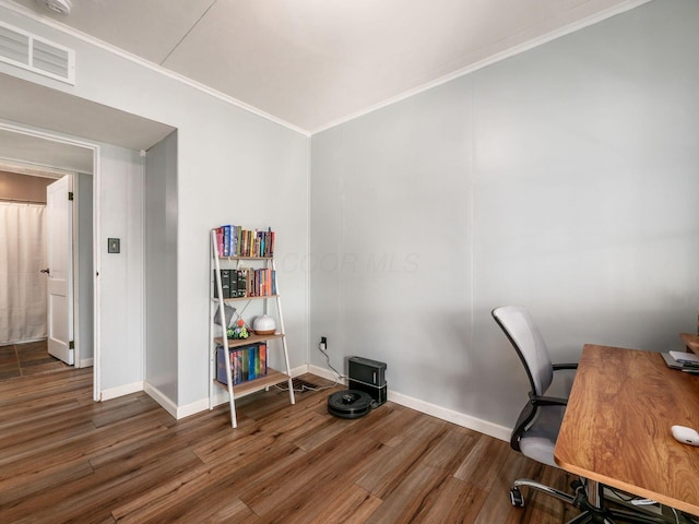 office space with visible vents, ornamental molding, and wood finished floors