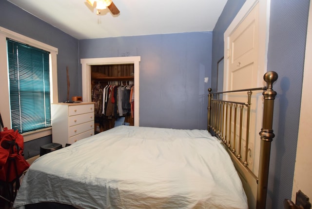 bedroom with a closet and a ceiling fan