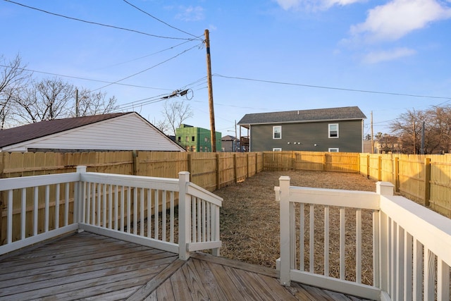 deck with a fenced backyard