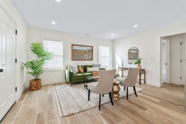 interior space featuring visible vents, light wood-style flooring, recessed lighting, and baseboards