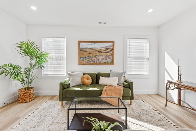 sitting room with visible vents, recessed lighting, baseboards, and light wood-style floors