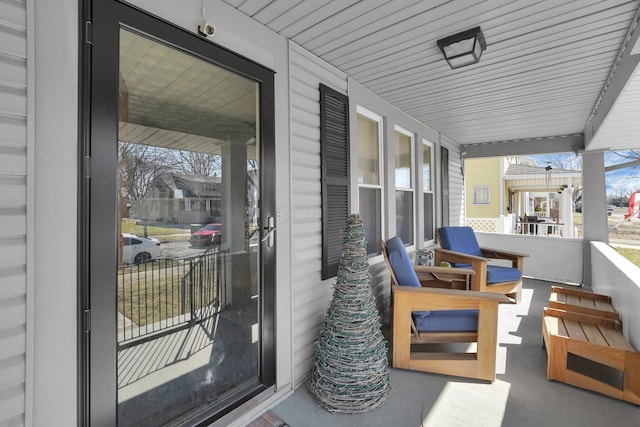 view of patio featuring a porch