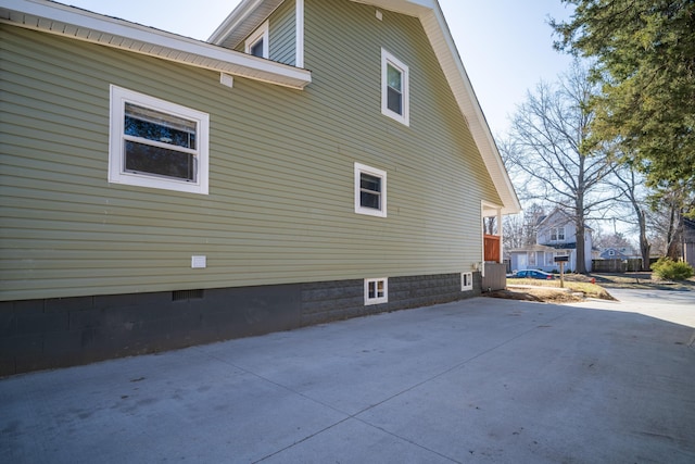 view of property exterior with crawl space