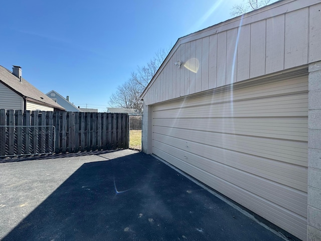 garage with fence