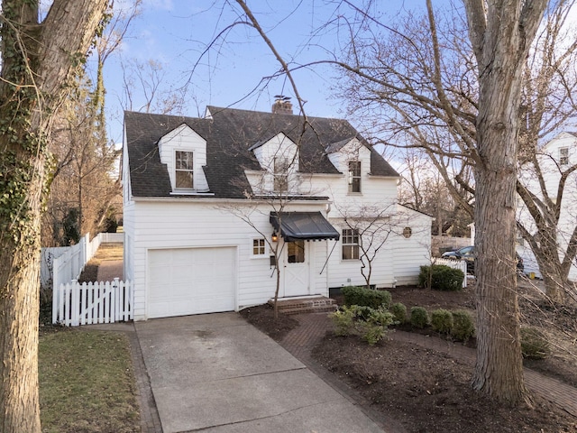 view of front of property featuring driveway, a gate, fence, roof with shingles, and a chimney