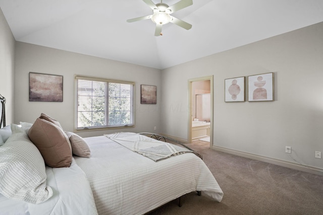 bedroom with lofted ceiling, a ceiling fan, ensuite bathroom, carpet flooring, and baseboards