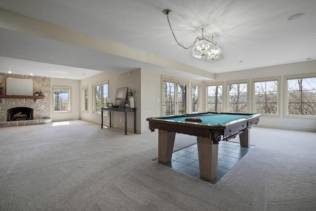 game room with baseboards, carpet floors, a stone fireplace, pool table, and french doors