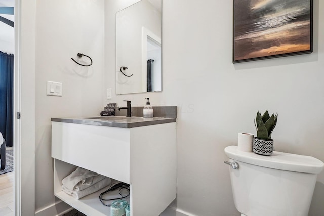 half bath with toilet and vanity