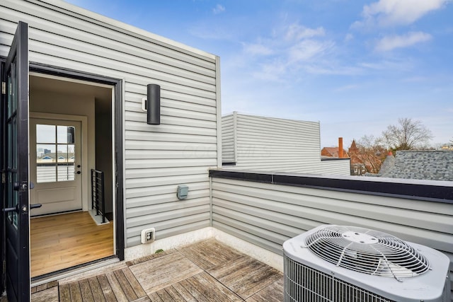 balcony featuring central AC