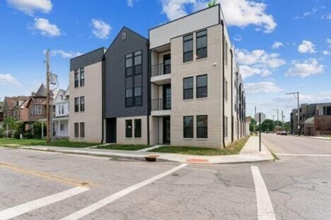 view of building exterior with a residential view