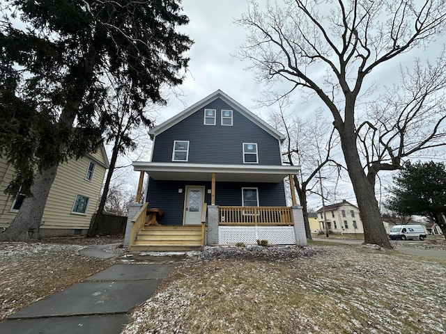 view of front of property featuring covered porch