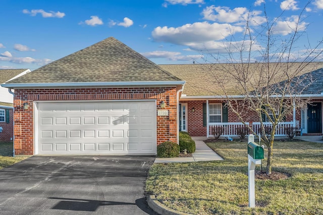 ranch-style house featuring a garage, brick siding, driveway, and a shingled roof