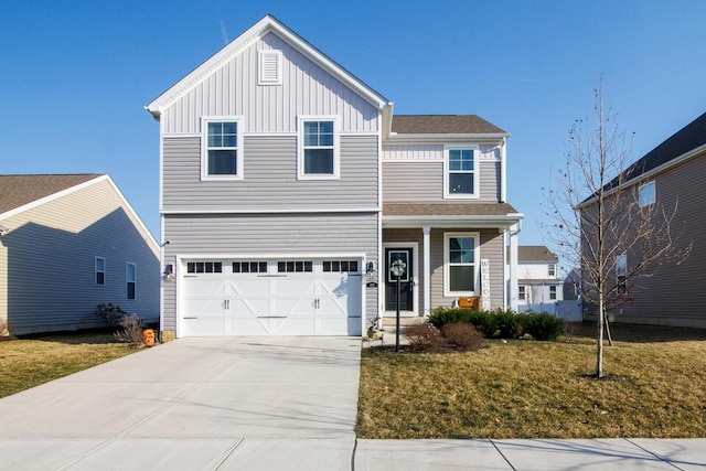 view of front of home with a porch, board and batten siding, concrete driveway, a front yard, and a garage