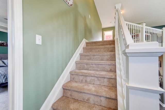 staircase with baseboards