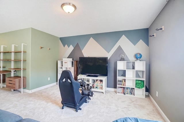 interior space with baseboards, carpet, and an accent wall