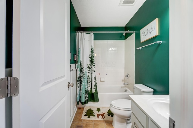 full bath featuring visible vents, toilet, shower / tub combo with curtain, and vanity