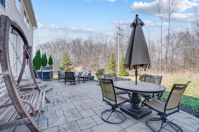 view of patio / terrace featuring outdoor dining area, grilling area, and outdoor lounge area