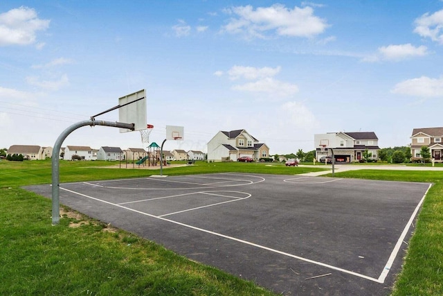 view of basketball court with community basketball court, playground community, and a yard