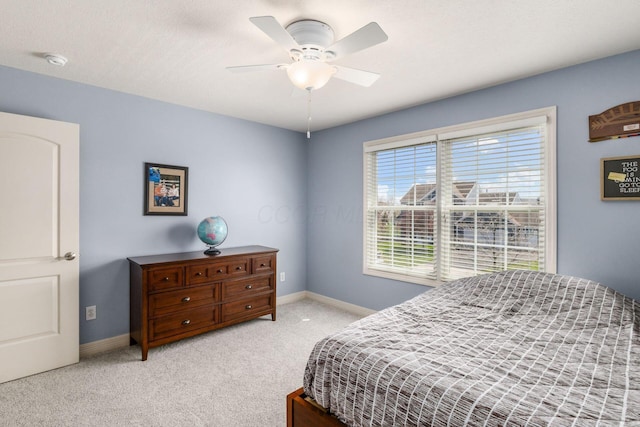 6148 Ryan Woods Way, Hilliard, OH 43026 - bedroom with light colored carpet, ceiling fan, and baseboards