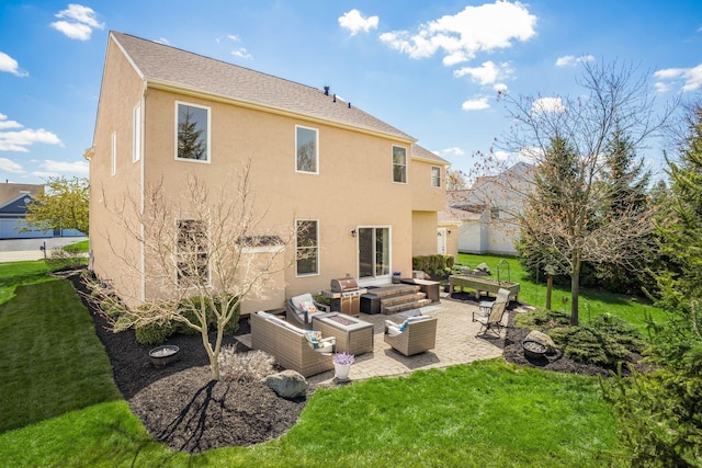 6148 Ryan Woods Way, Hilliard, OH 43026 - back of house featuring a patio area, an outdoor hangout area, a yard, and stucco siding