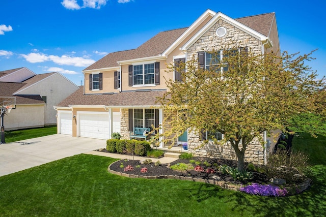 6148 Ryan Woods Way, Hilliard, OH 43026 - traditional-style home featuring driveway, stone siding, a porch, roof with shingles, and a front yard