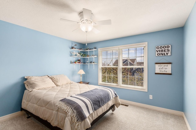 6148 Ryan Woods Way, Hilliard, OH 43026 - bedroom featuring ceiling fan, baseboards, carpet flooring, and visible vents