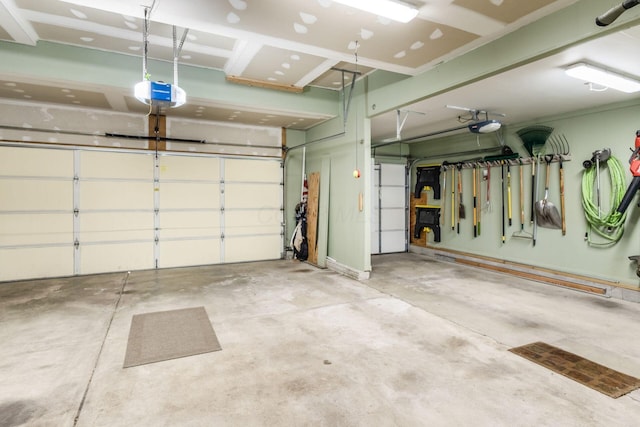 6148 Ryan Woods Way, Hilliard, OH 43026 - garage featuring a garage door opener