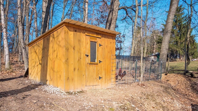 view of outbuilding with an outdoor structure